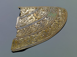 591 Helmet cheek-piece cast in silver and gilded. [K453]