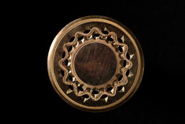 1953F288 Copper gilt button with concentric pierced and chased decoration